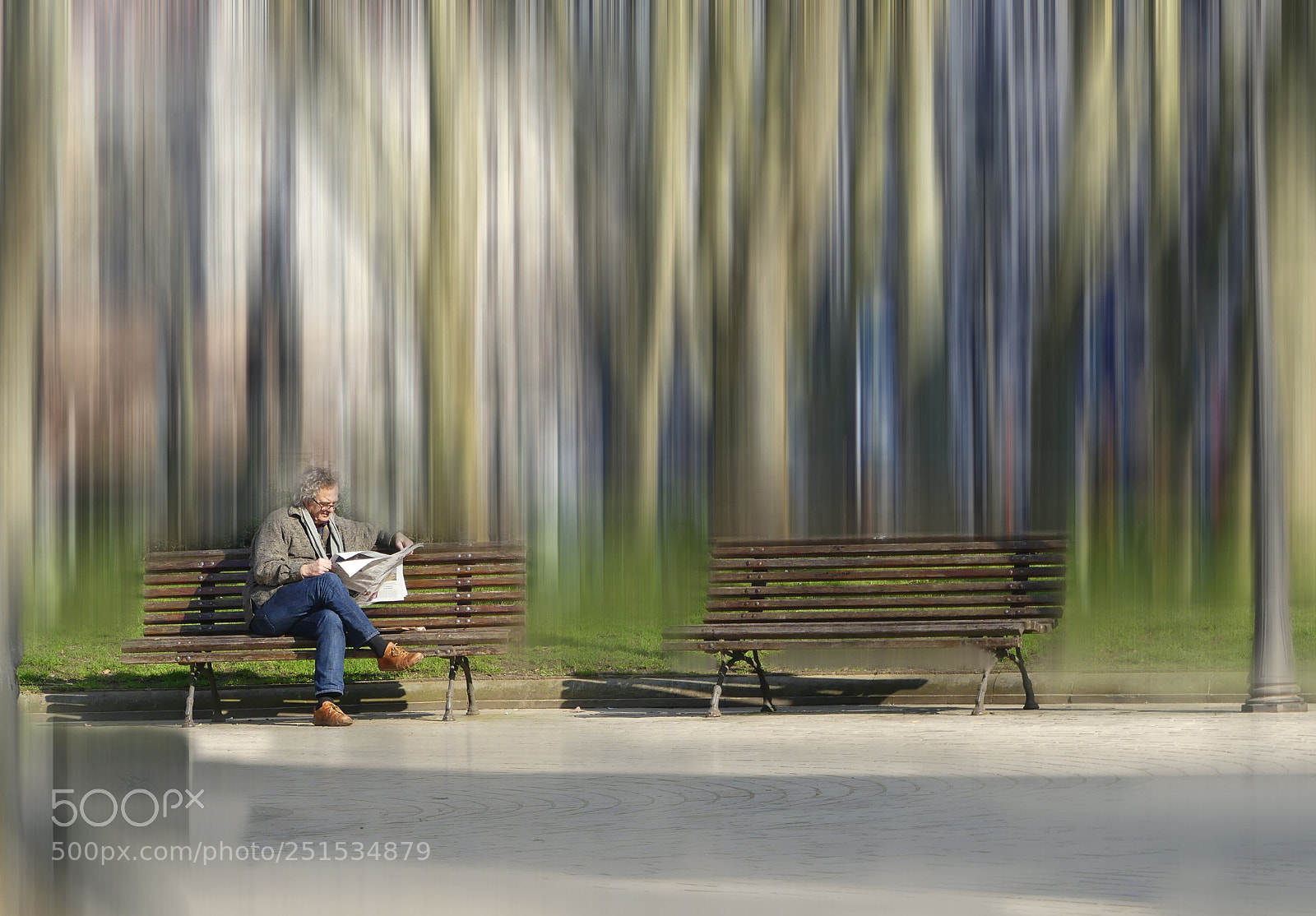 Panasonic Lumix DMC-FZ300 sample photo. Hombre leyendo en el photography