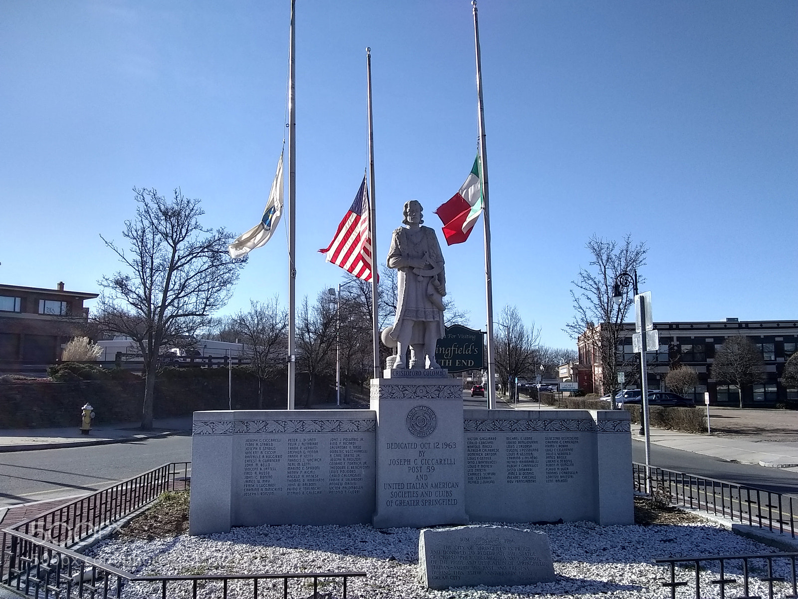 Motorola Moto E4 sample photo. 3 flags and a saint photography
