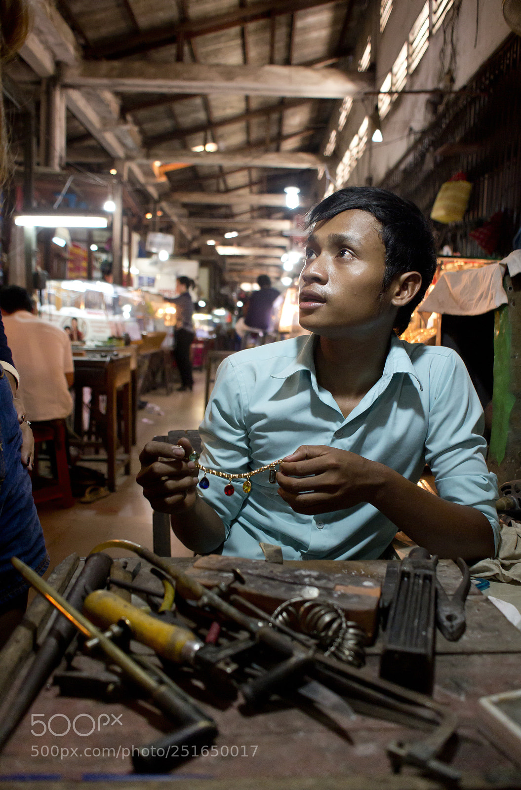 Canon EOS 600D (Rebel EOS T3i / EOS Kiss X5) sample photo. Young worker in the photography