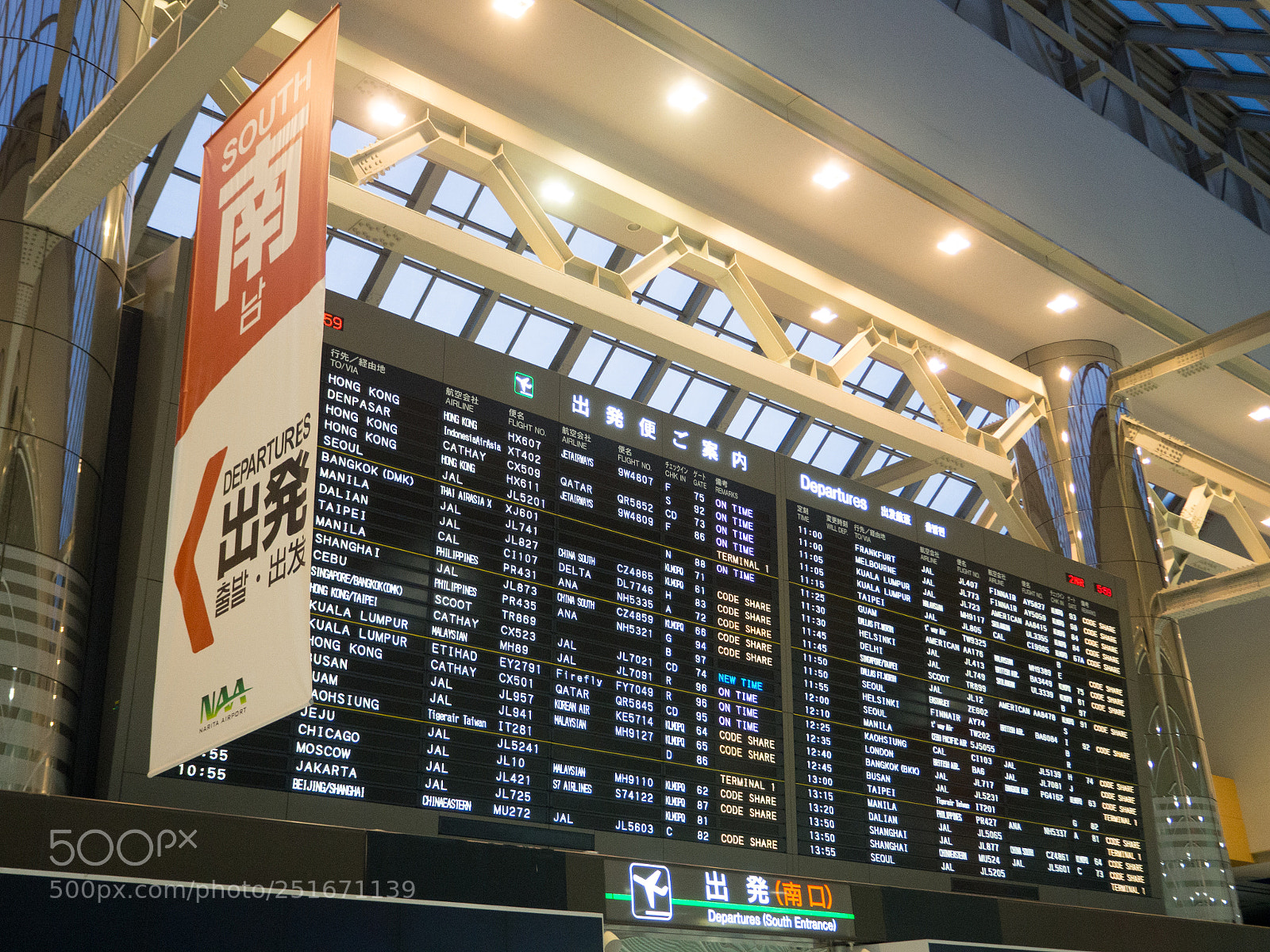 Olympus OM-D E-M10 sample photo. Airport flight schedule photography
