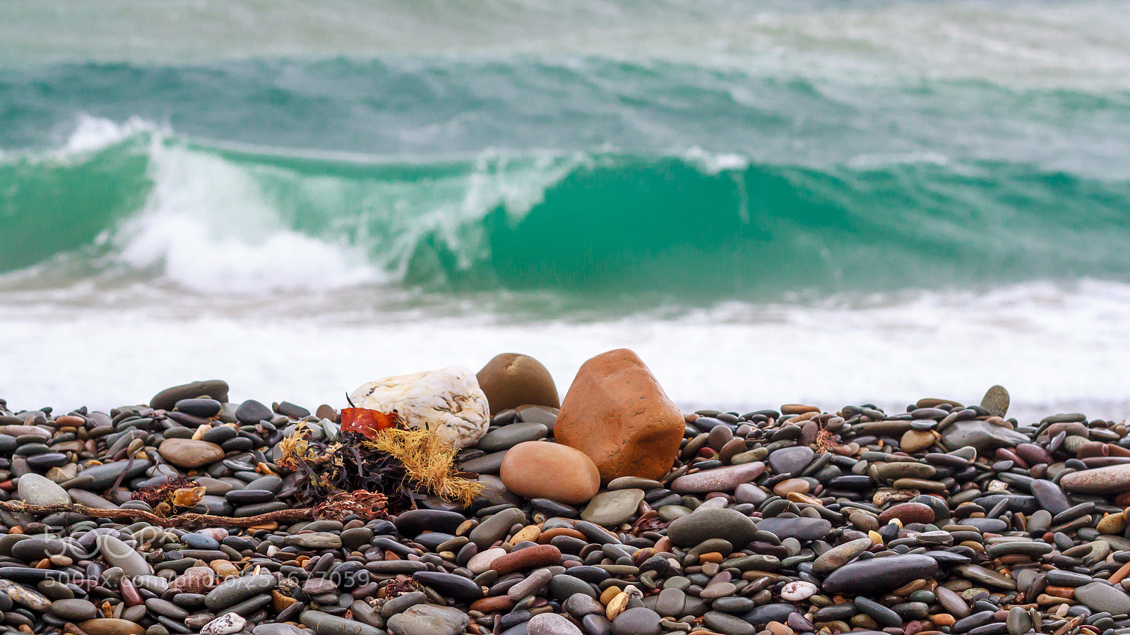 Canon EOS 7D sample photo. A stony beach photography