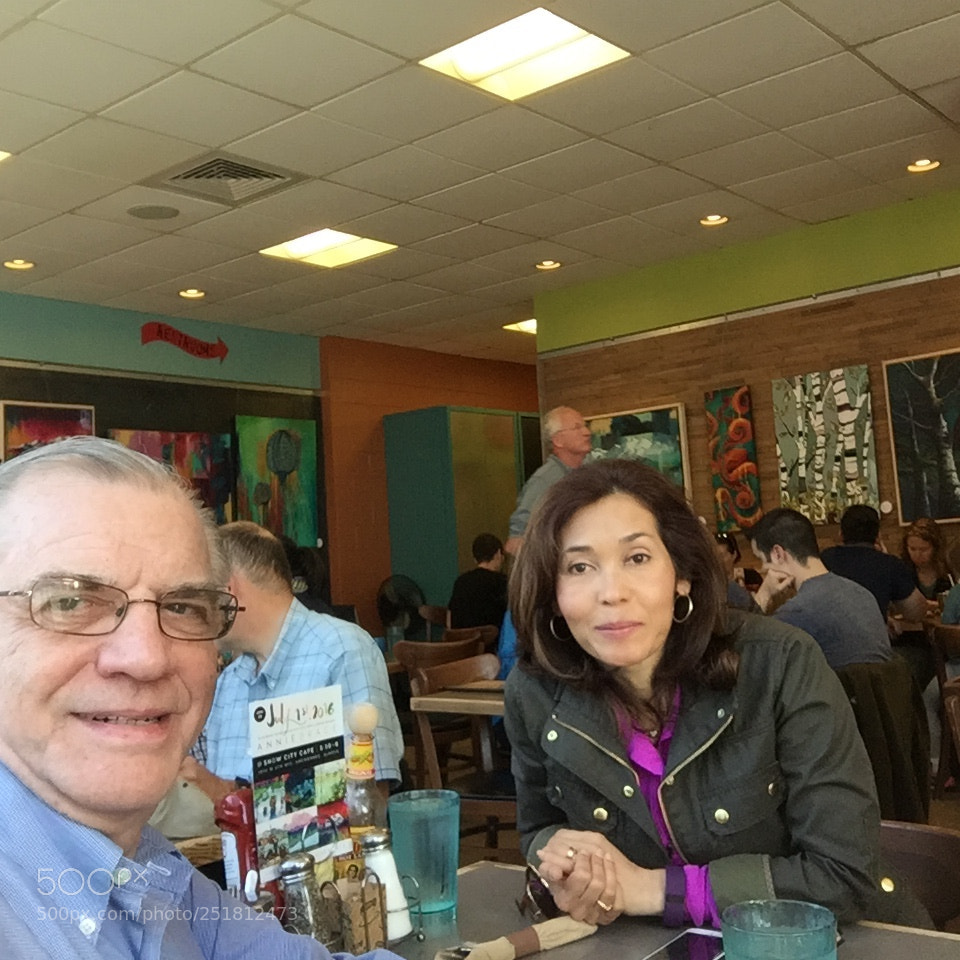 Apple iPhone 6 sample photo. Snow city cafe with photography