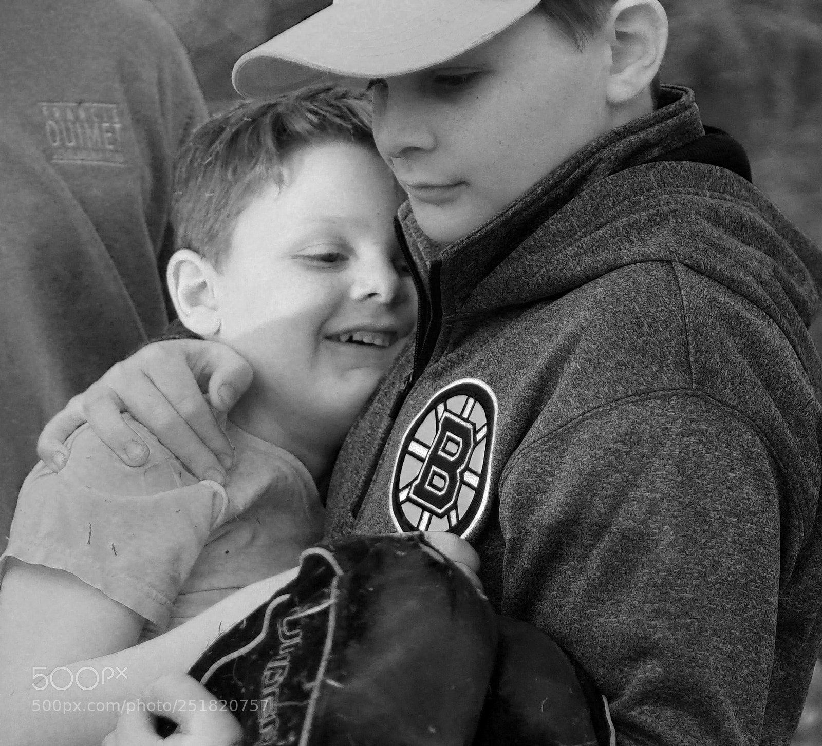 Sony a6500 sample photo. Big brother carrying hurt photography