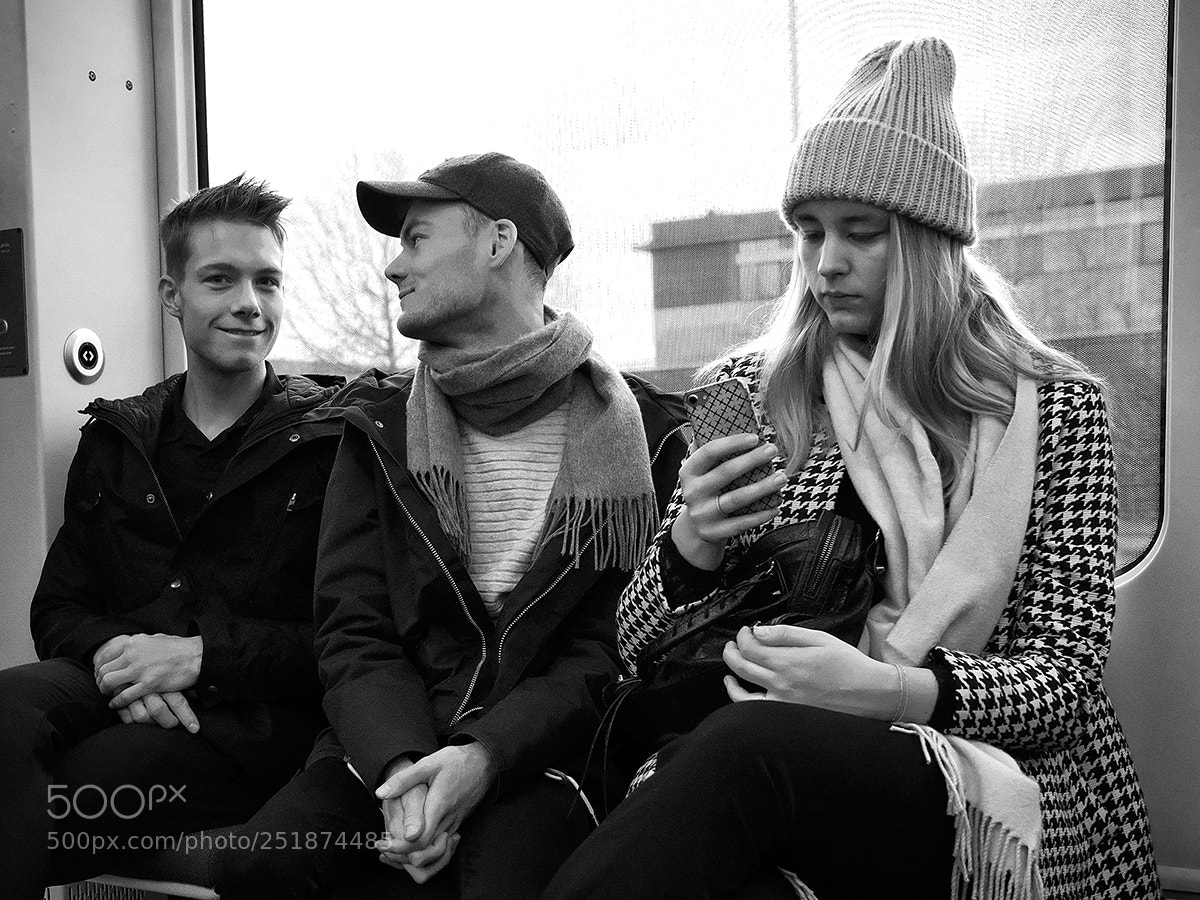 Fujifilm X-Pro2 sample photo. Light rail passengers photography
