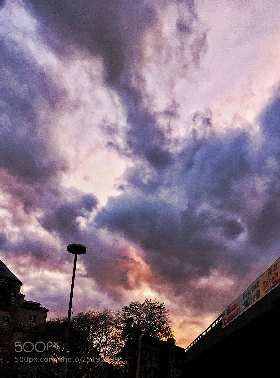 Apple iPhone SE sample photo. Clouds over berlin  photography