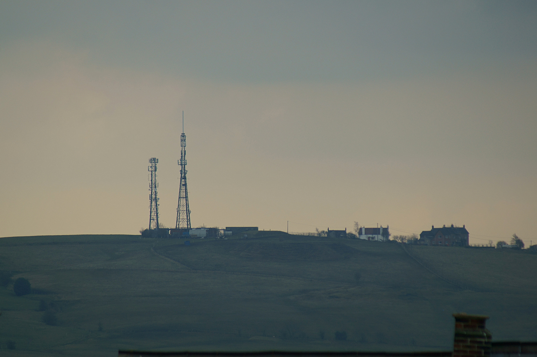 Sony SLT-A58 + Sony 75-300mm F4.5-5.6 sample photo. A stark day on a hill loaded with masts. photography