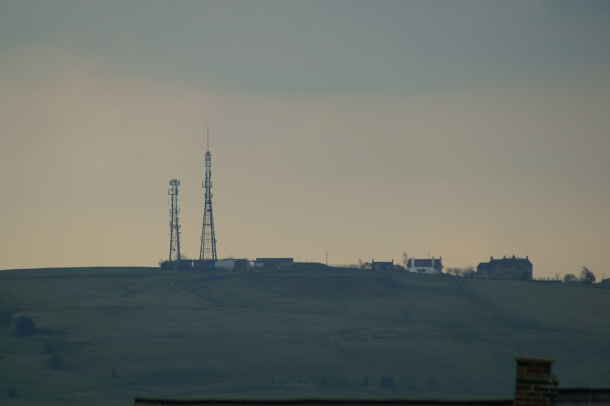 Sony 75-300mm F4.5-5.6 sample photo. A stark day on a hill loaded with masts. photography