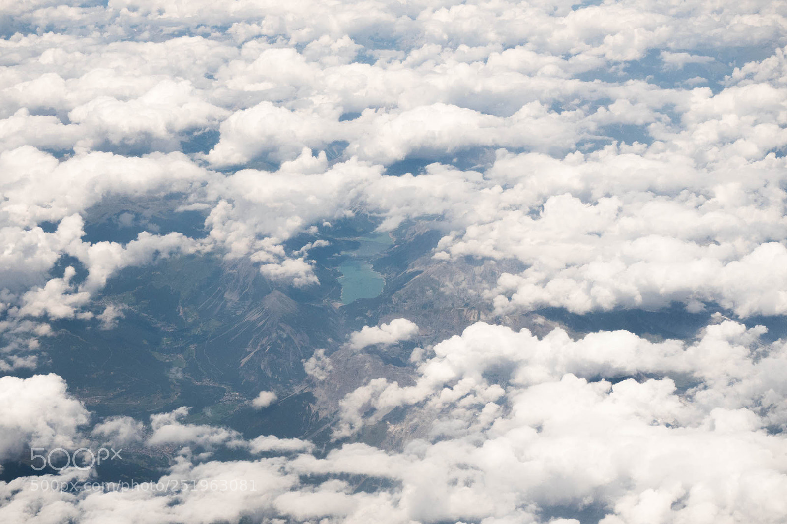 Olympus OM-D E-M5 II sample photo. Hole in the clouds photography