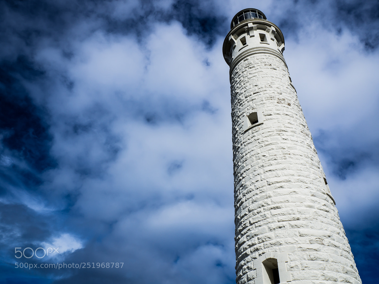 Olympus OM-D E-M10 sample photo. Lighthouse in the storm photography