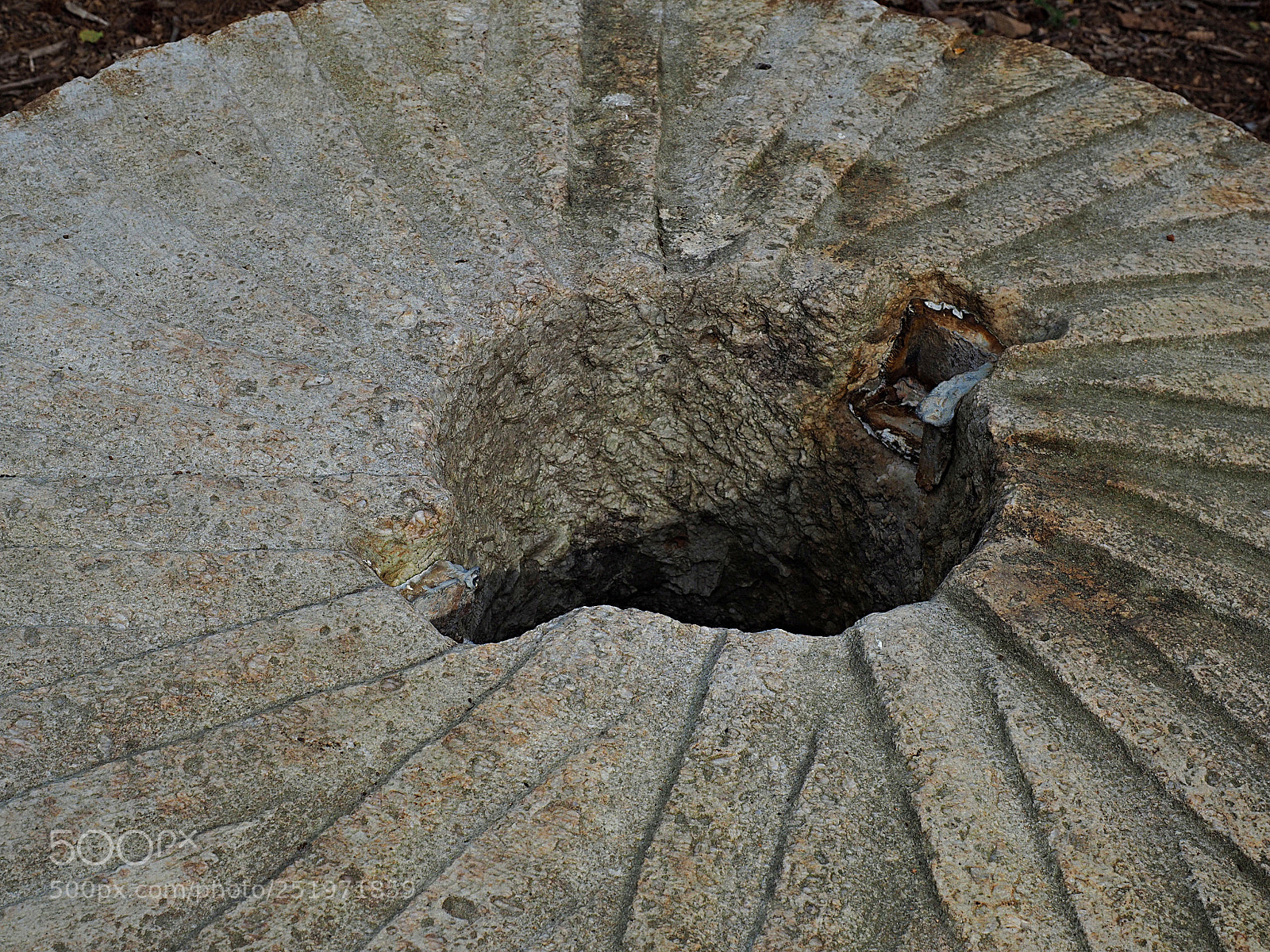 Olympus OM-D E-M5 II sample photo. Old historic millstone photography