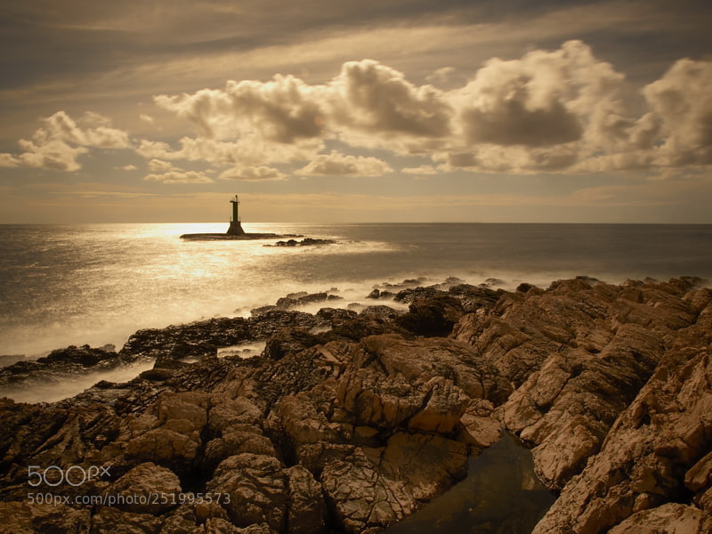 Olympus E-520 (EVOLT E-520) sample photo. Cloudy lighthouse photography