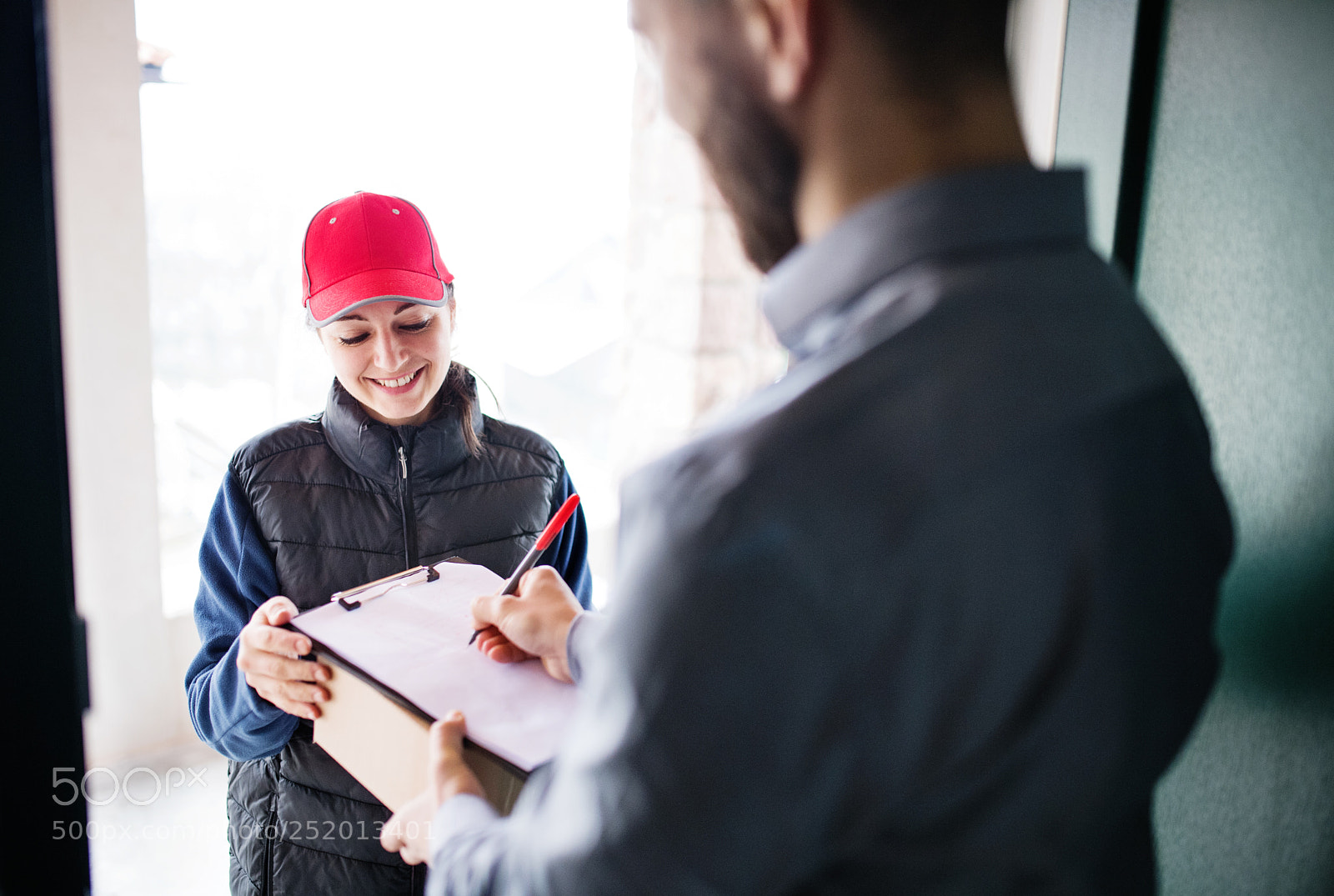 Nikon D5 sample photo. A man receiving parcel photography