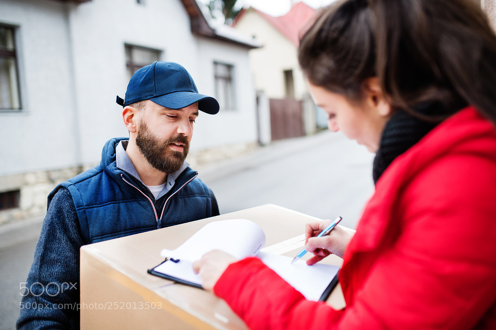 Nikon D5 sample photo. Woman receiving parcel from photography
