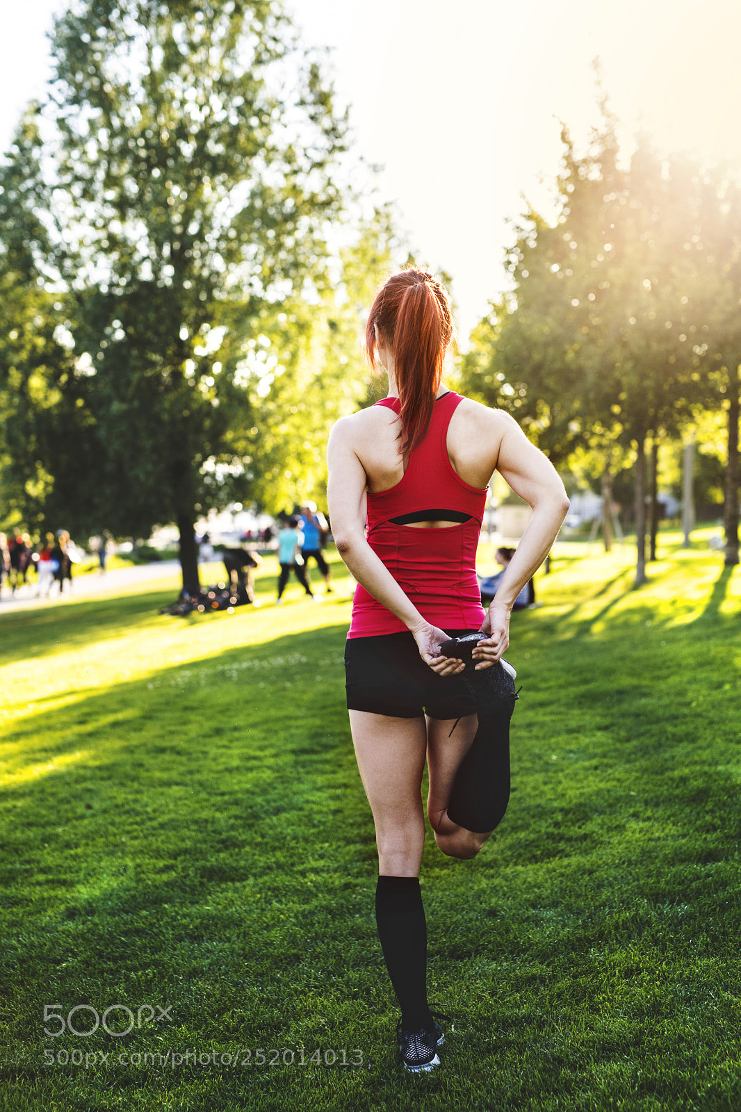 Nikon D5 sample photo. Young runner stretching and photography