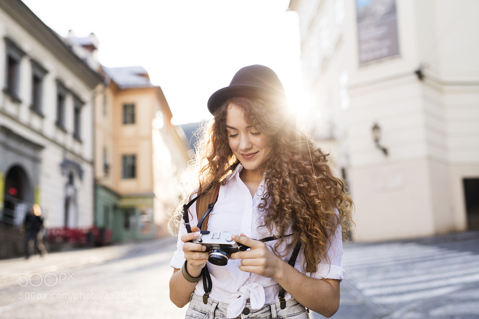 Nikon D5 sample photo. Young tourist with camera photography