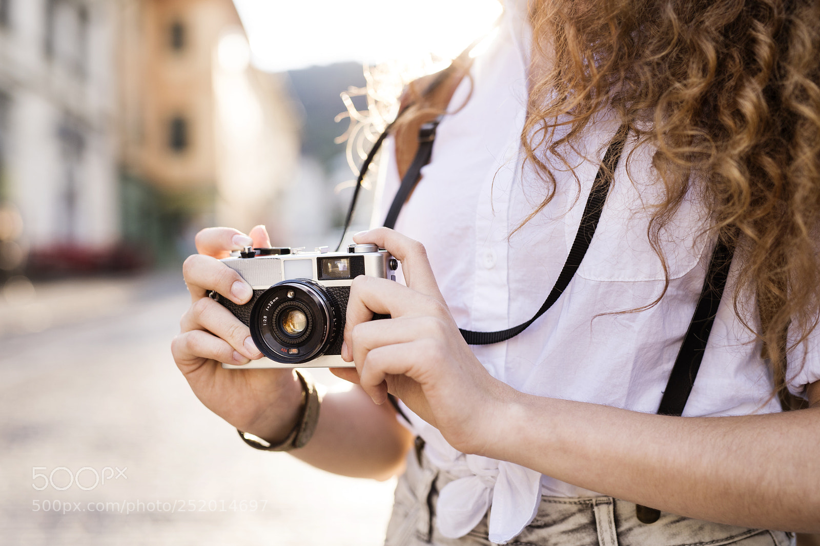 Nikon D5 sample photo. Young tourist with camera photography
