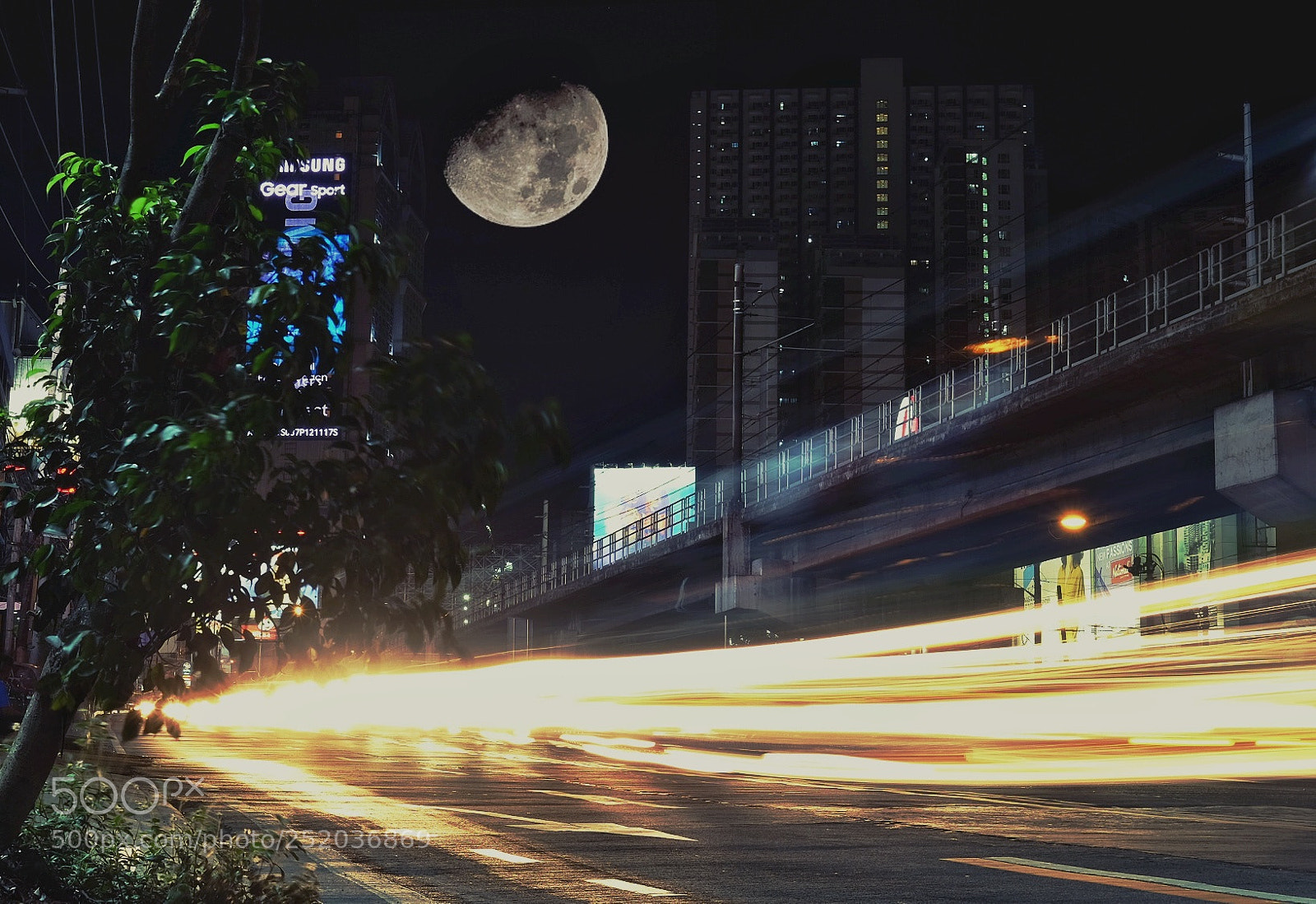 Fujifilm X-T10 sample photo. Blaze of headlights photography