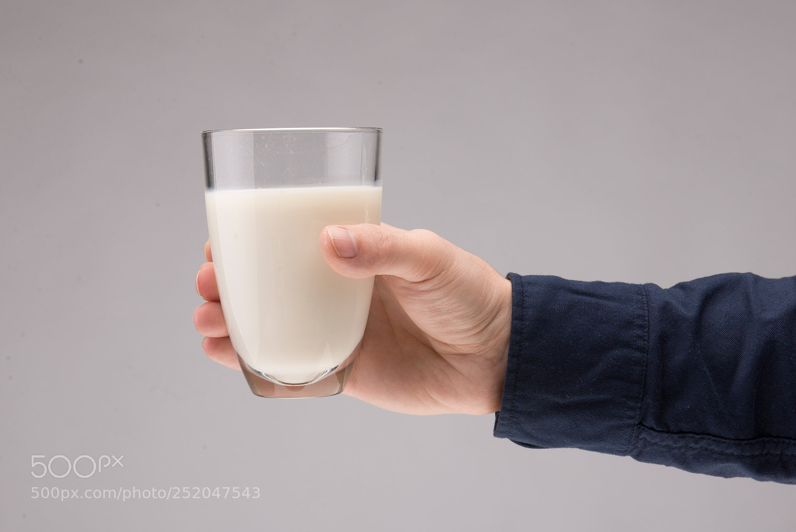 Nikon D610 sample photo. Hand with a glass photography
