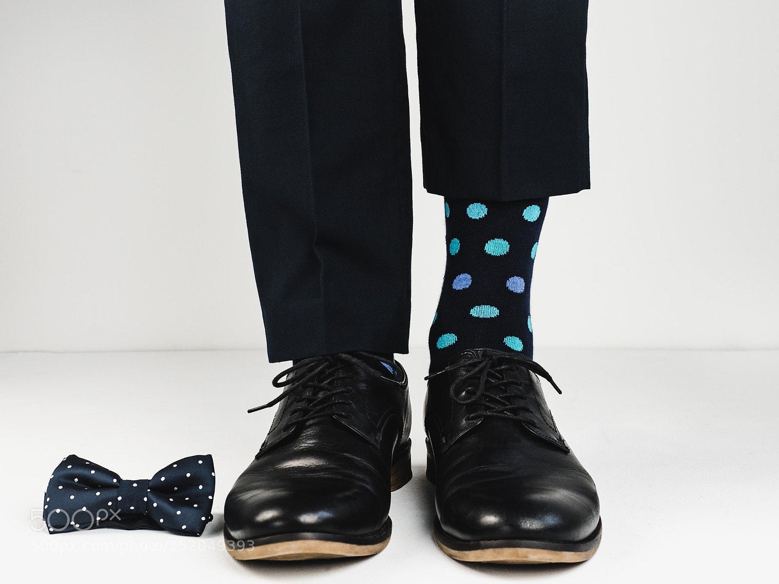 Olympus OM-D E-M5 II sample photo. Stylish shoes, bright socks photography