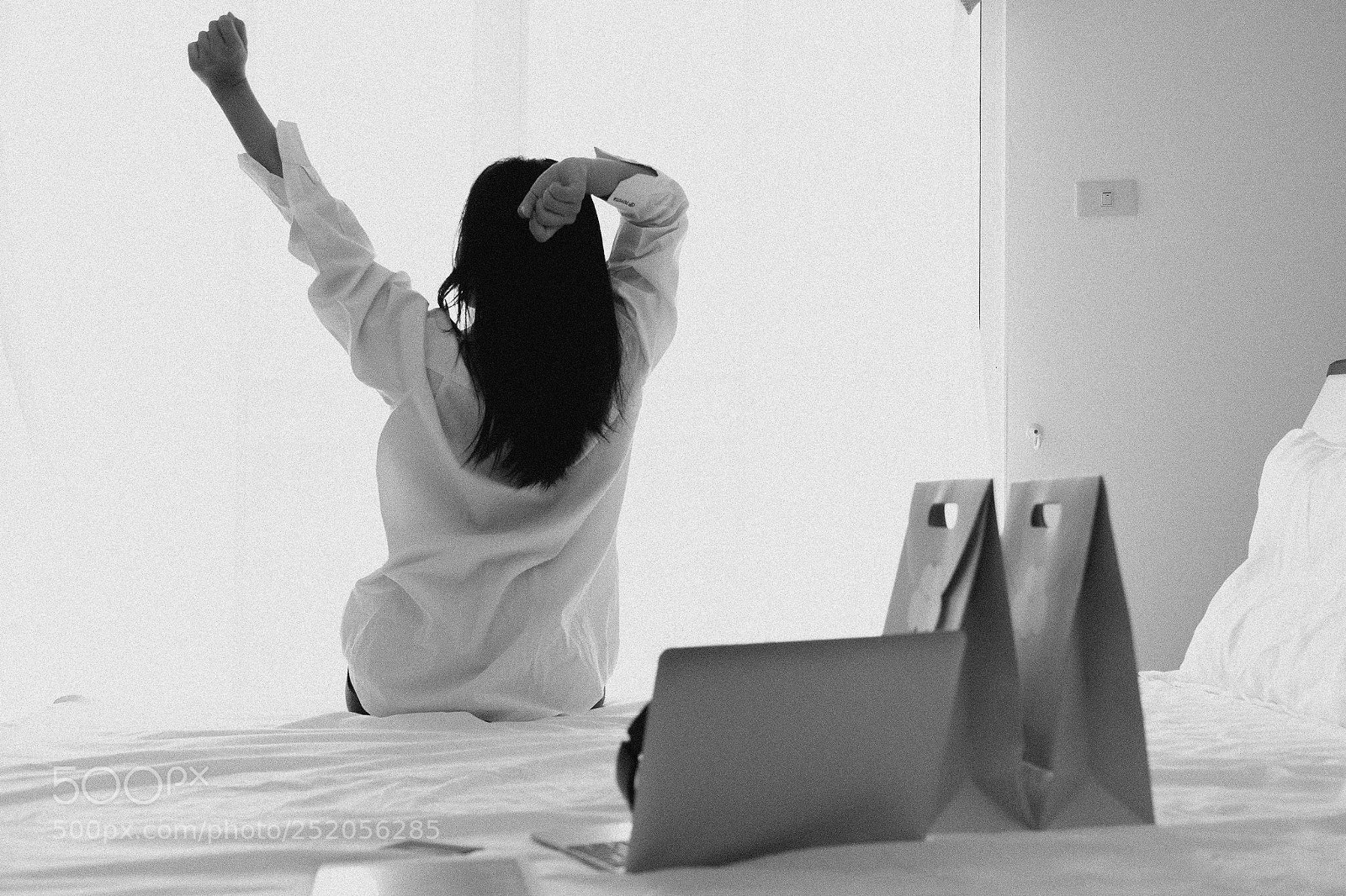 Fujifilm X-T2 sample photo. Woman stretching in bed photography