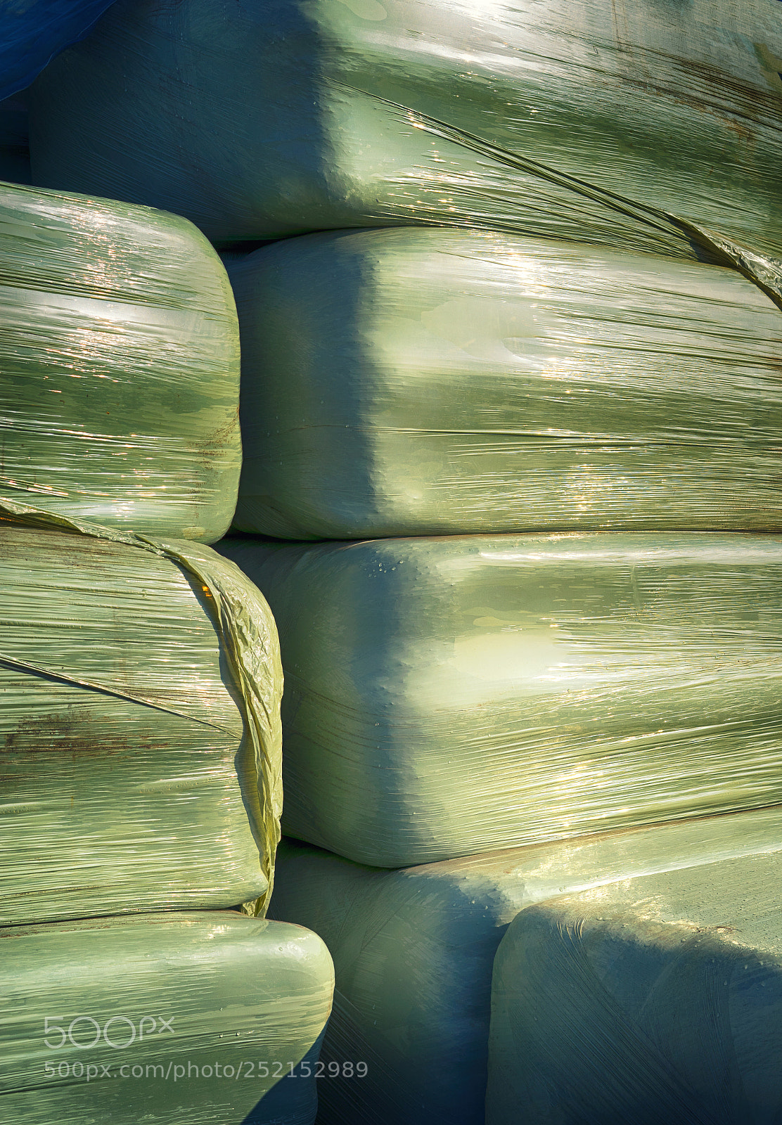 Sony a7 sample photo. Stacked green hay balls photography