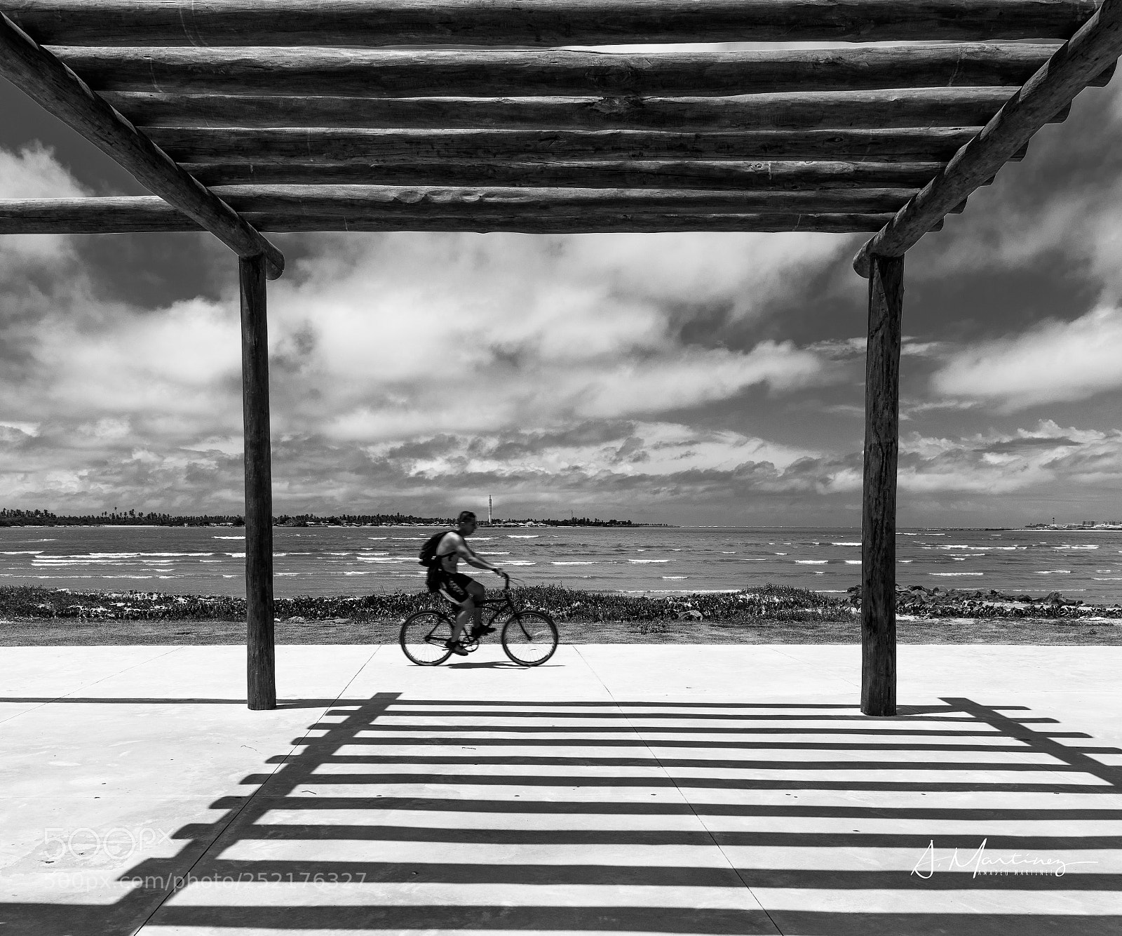 Canon EOS 5D Mark IV sample photo. Framed cyclist photography