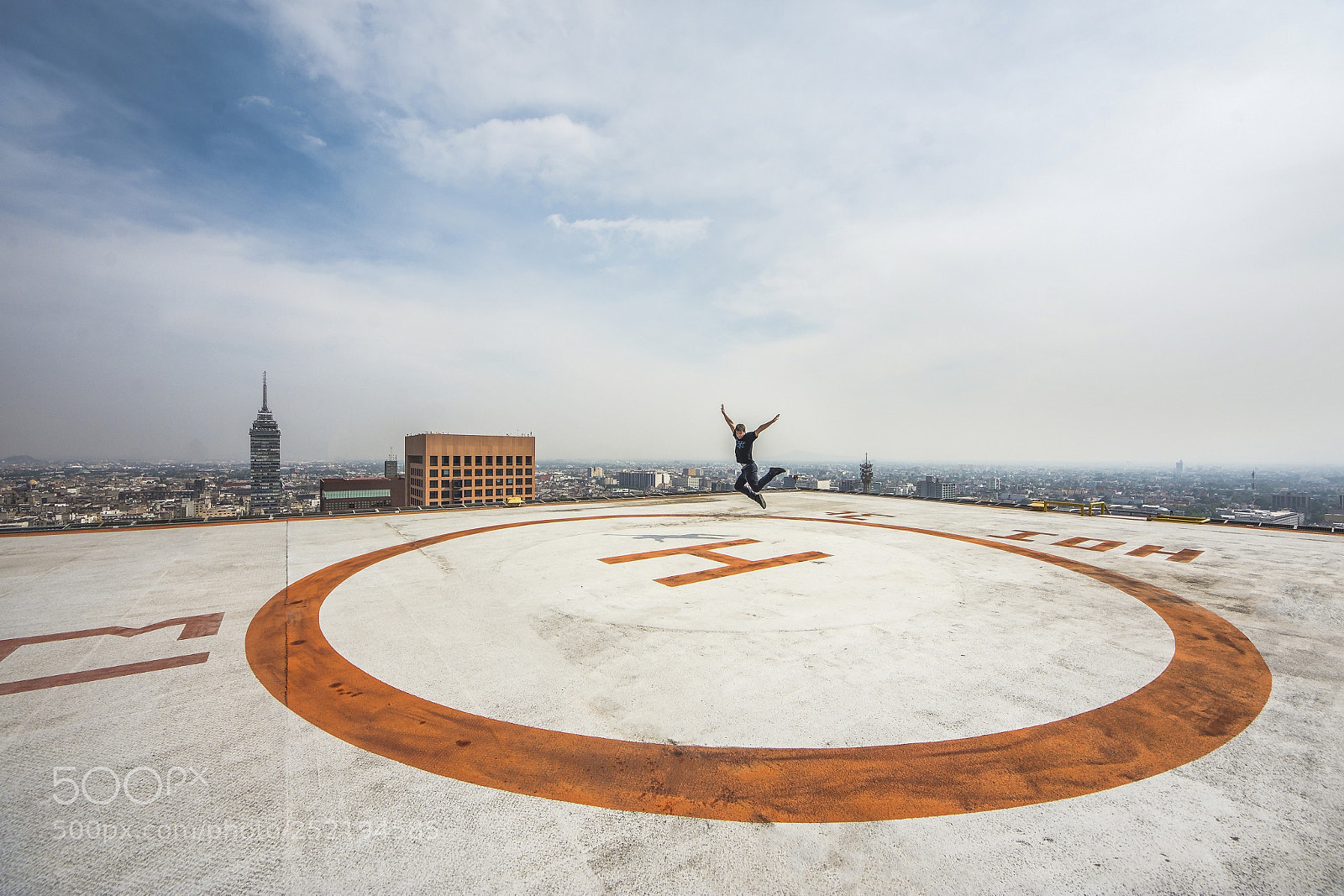 Nikon D7200 sample photo. Men jumping helipad on photography