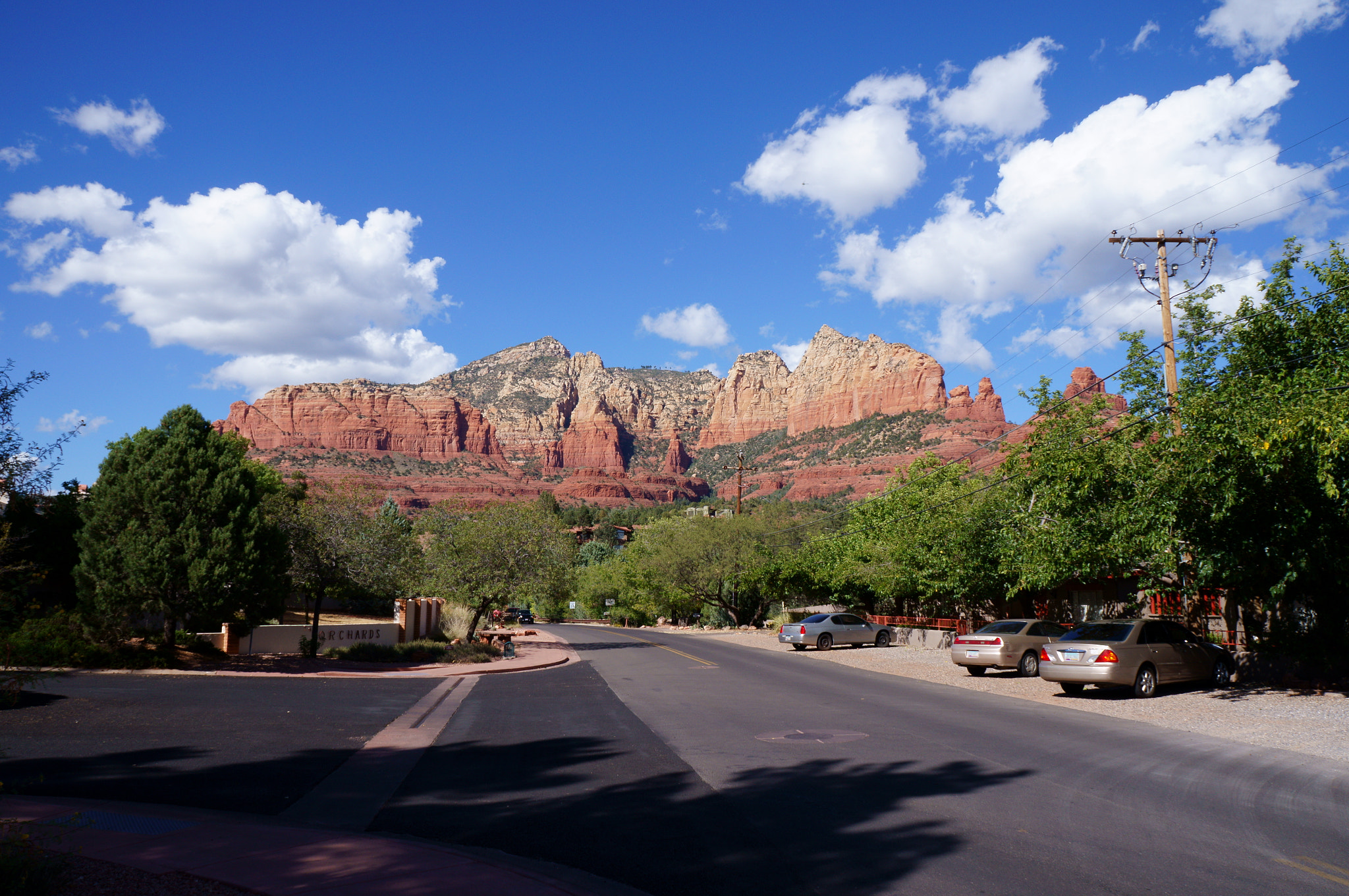 Sony Alpha NEX-F3 sample photo. Rocks and clouds photography