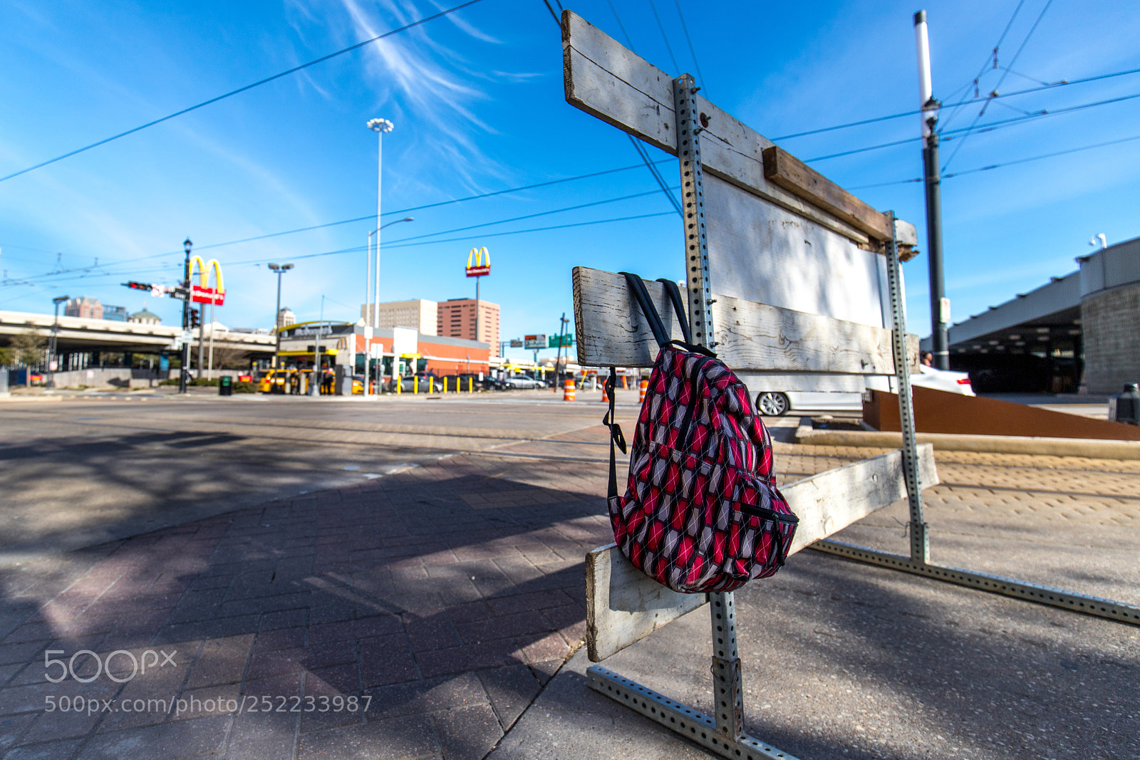 Canon EOS 6D Mark II sample photo. Backpack on barricade photography