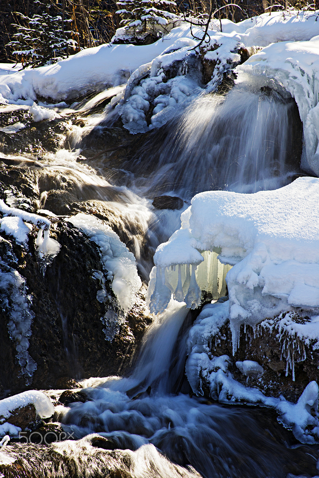 Canon EOS 6D Mark II sample photo. Falling water from snow photography