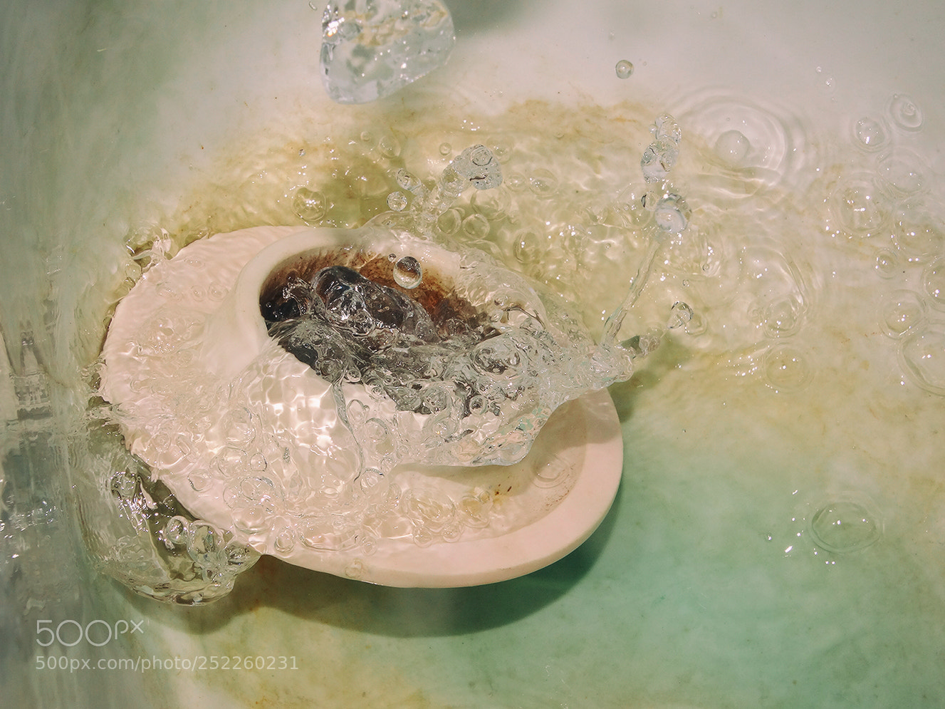 Sony Cyber-shot DSC-HX300 sample photo. Drain plug splash photography