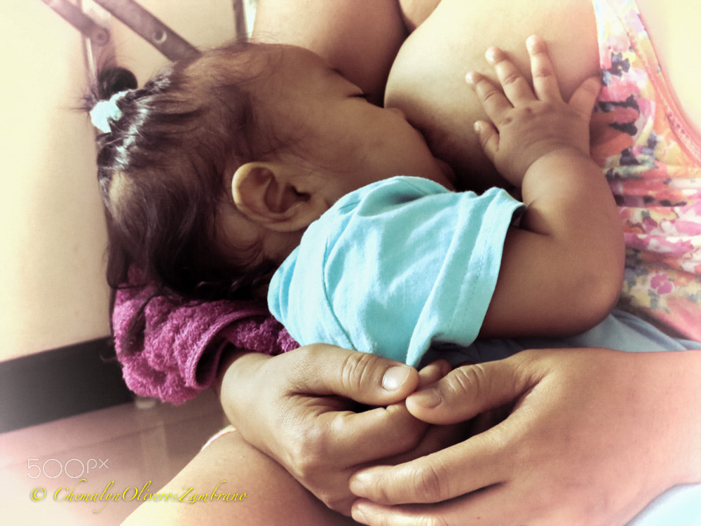 Canon PowerShot SX730 HS sample photo. I always feed you with love, my child photography