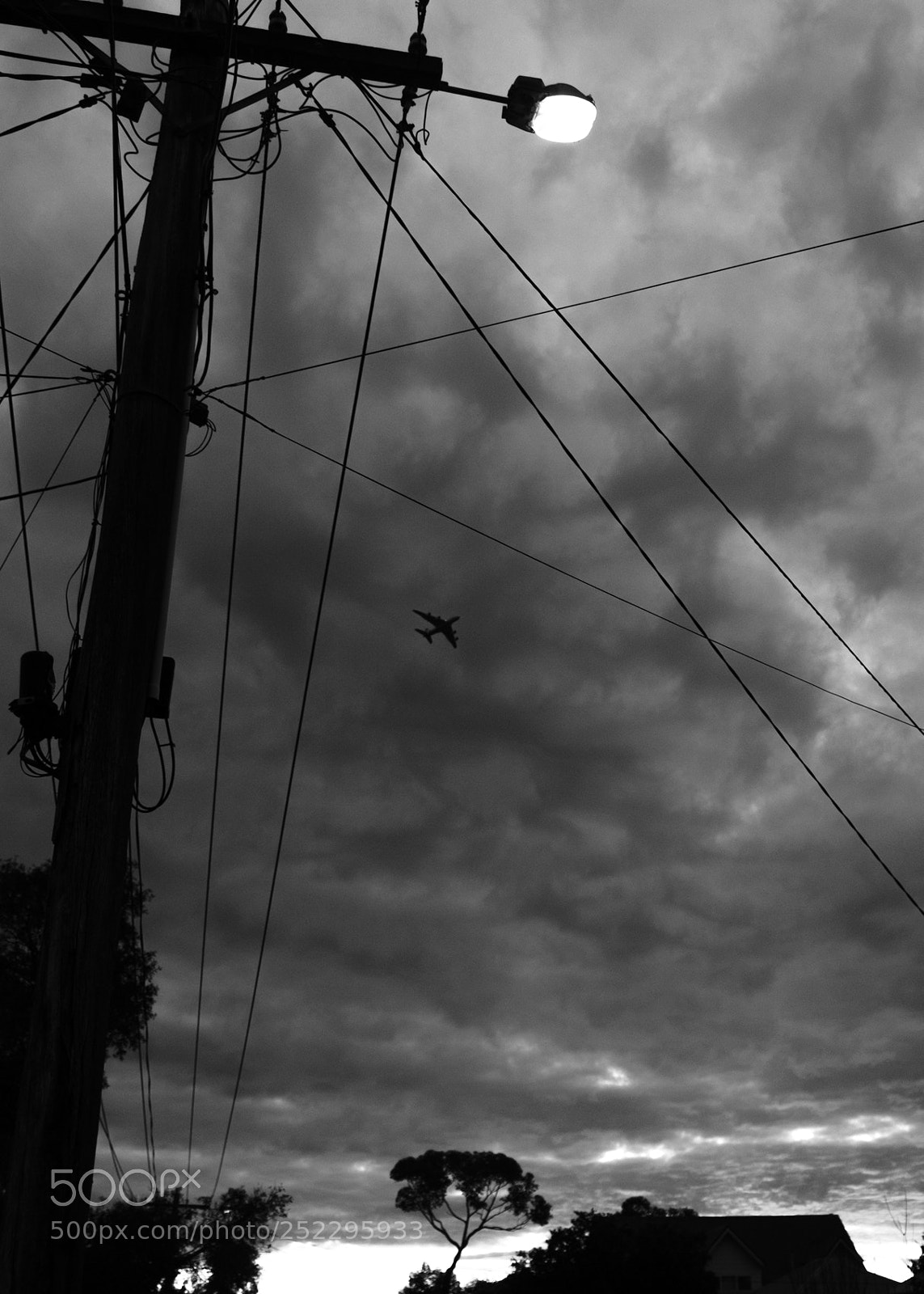 Fujifilm X-T2 sample photo. Plane, pole and wires photography