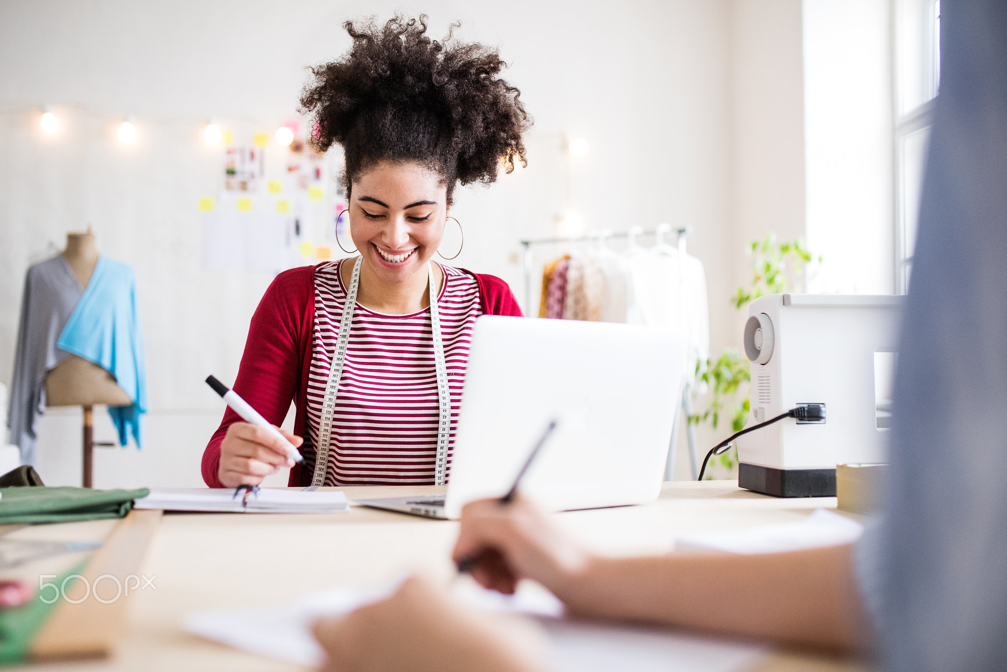 Young creative women in a studio, startup business.