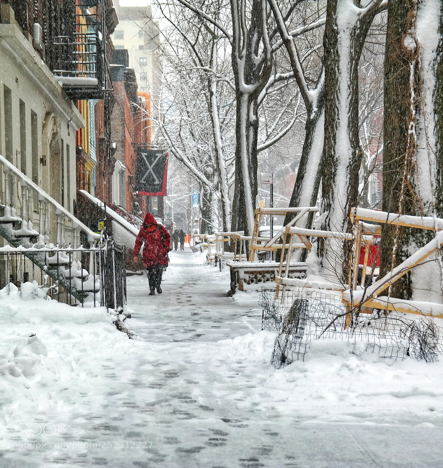 Samsung NX300 sample photo. Red coat coming photography