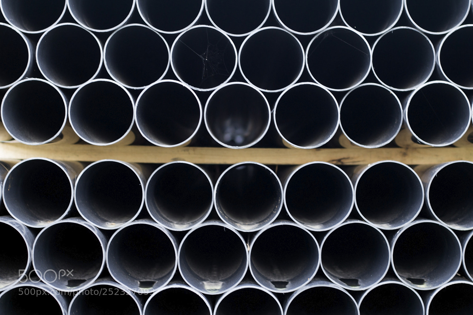 Canon EOS 60D sample photo. Stacked pvc pipe photography