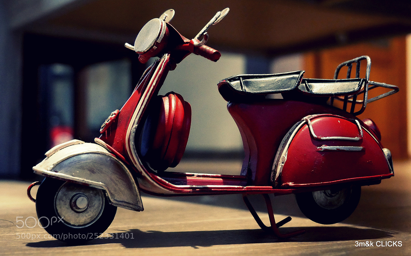 Panasonic Lumix DMC-G85 (Lumix DMC-G80) sample photo. Red scooter.. photography