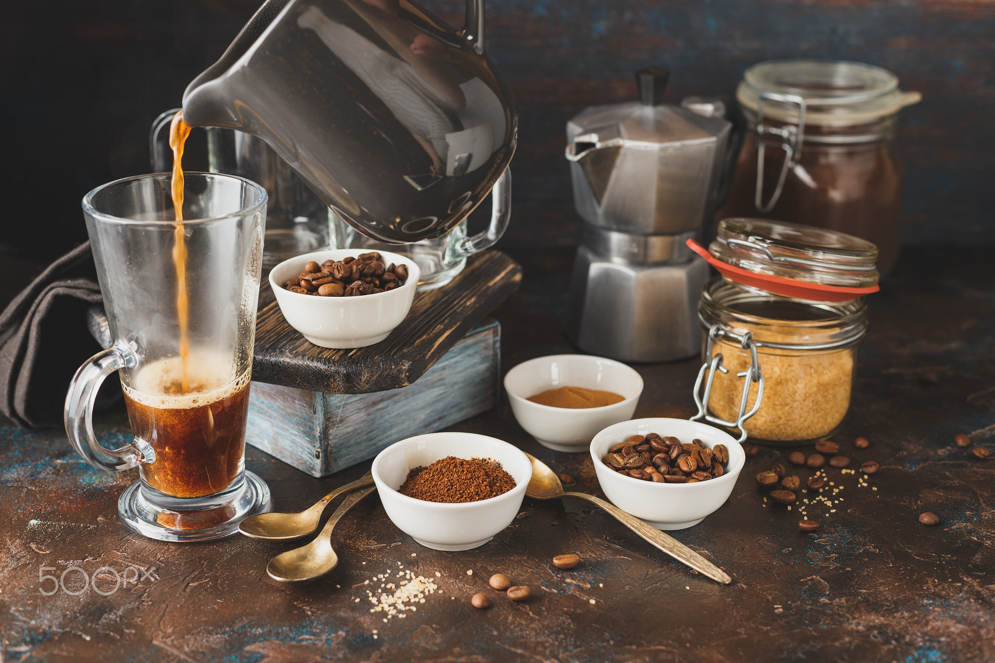 Coffee with coffee beans, ground coffee and brown sugar