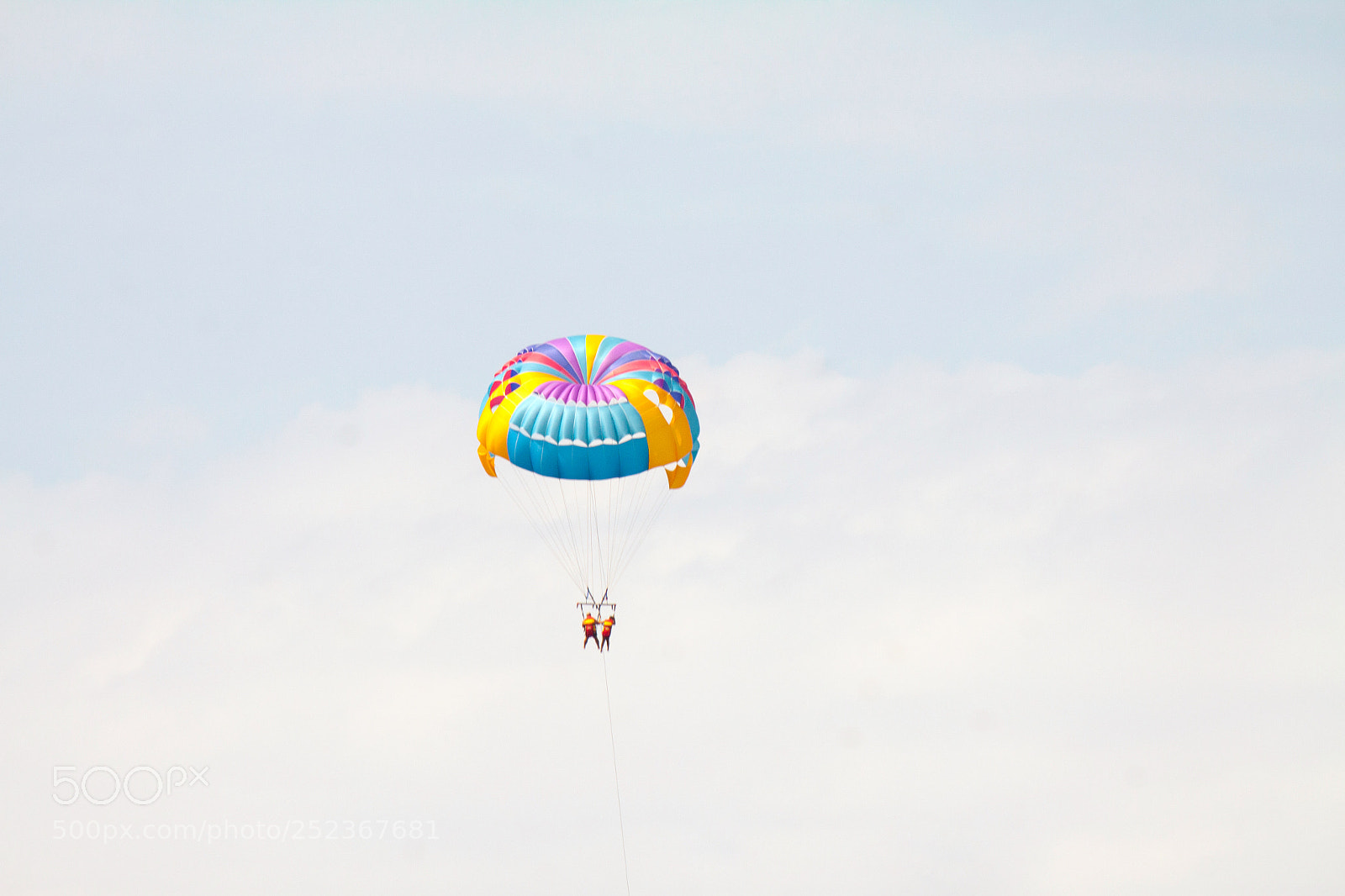 Canon EOS 50D sample photo. Parasailing in a blue photography