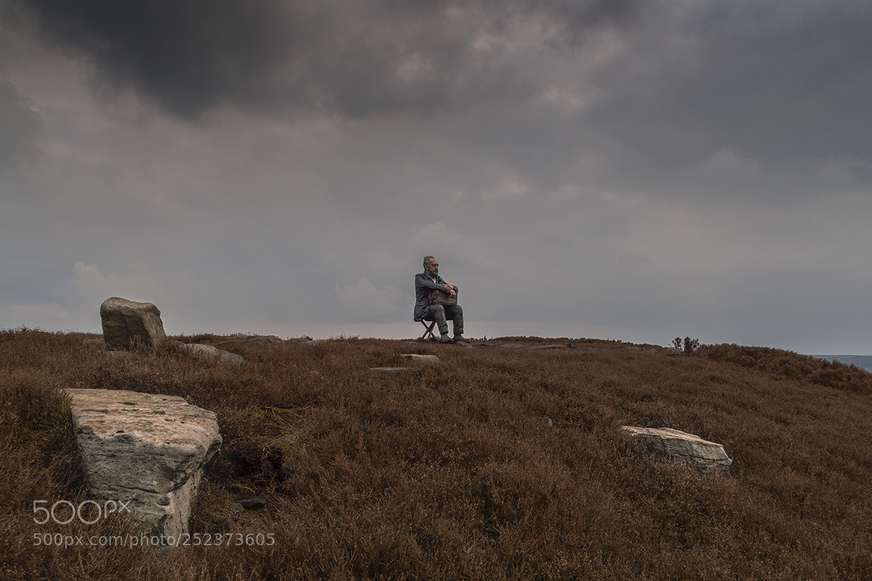 Canon EOS 7D sample photo. The seated man photography