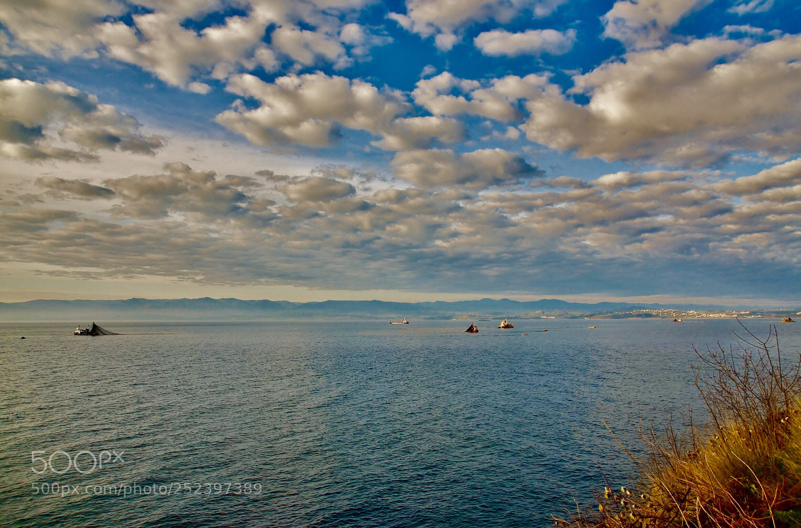 Nikon D7000 sample photo. Fishing boats and cloudy photography