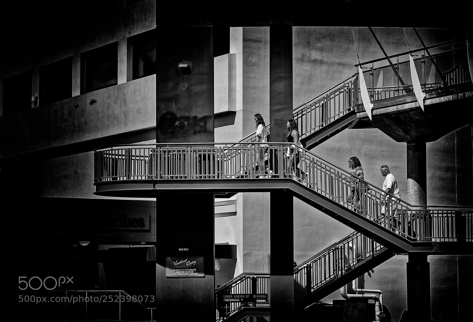 Nikon D7000 sample photo. Four people climbing steps photography