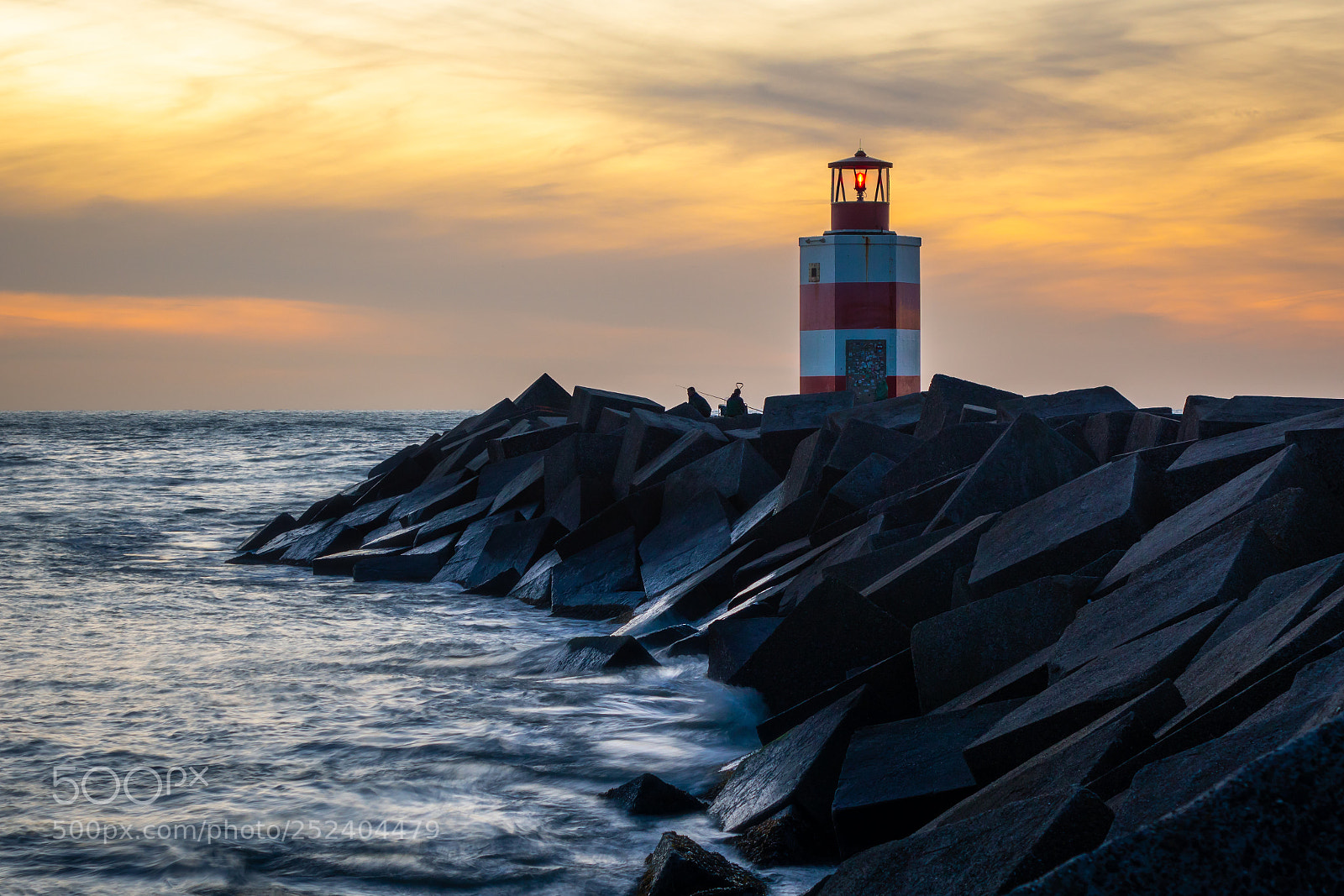Sony Cyber-shot DSC-RX10 sample photo. Lighthouse at sunset photography