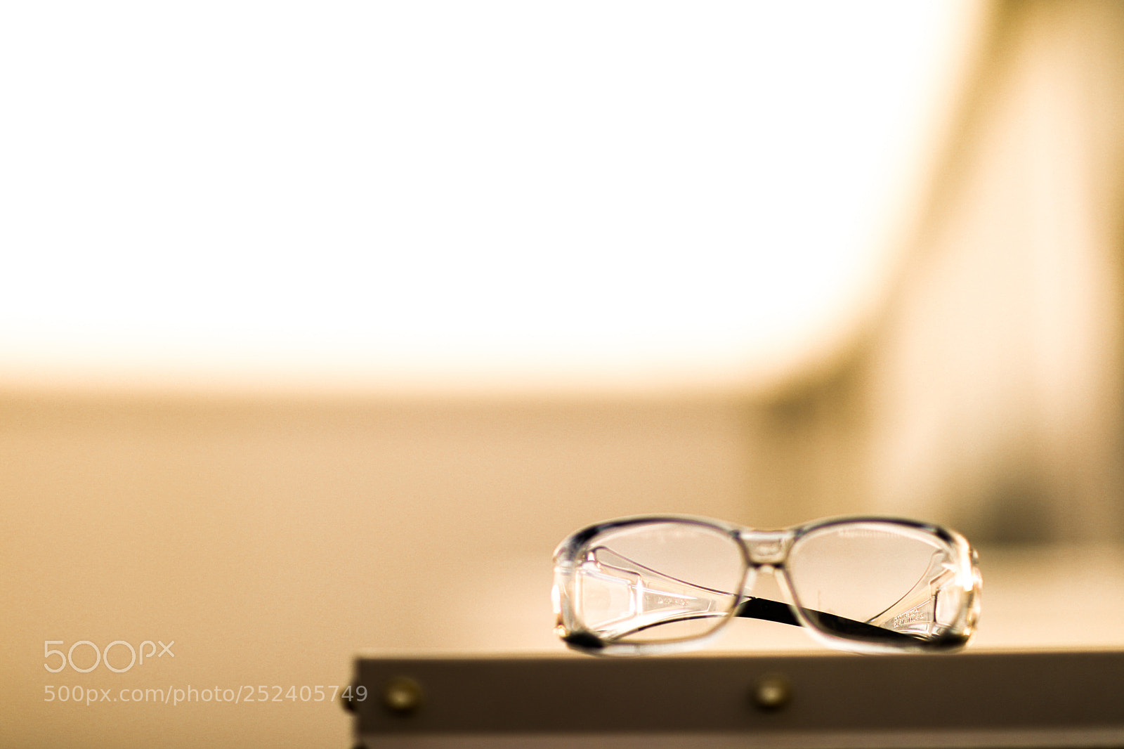 Canon EOS 5D Mark IV sample photo. Safety glasses on table photography
