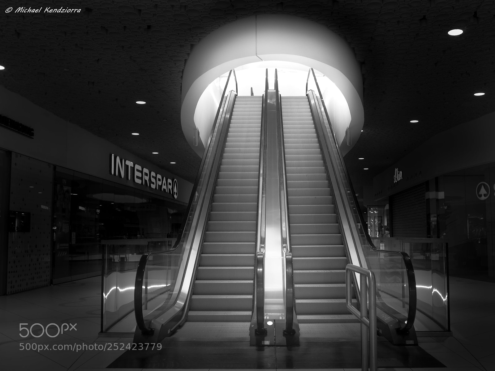 Olympus OM-D E-M10 II sample photo. Escalator photography