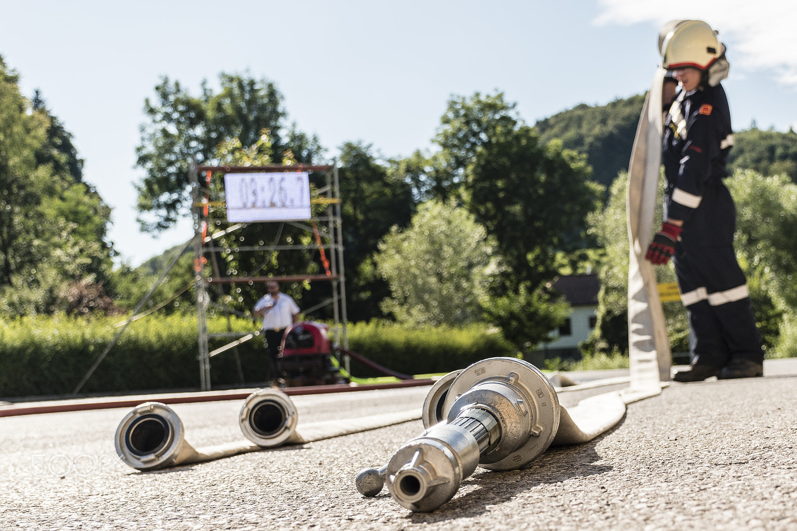 Nikon D5500 sample photo. Rolling up the hose photography