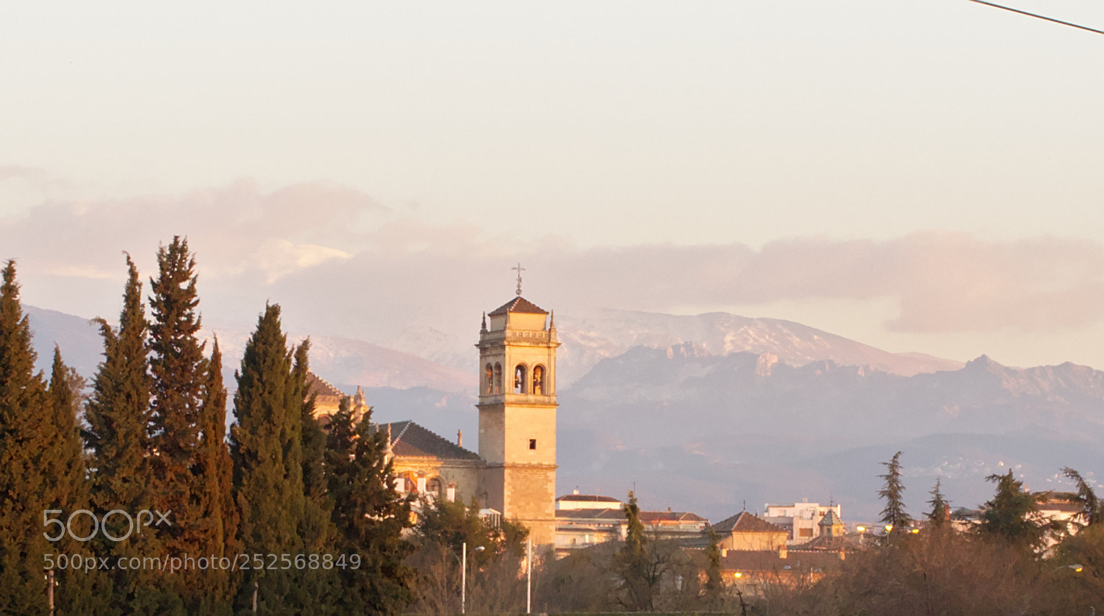 Olympus OM-D E-M10 III sample photo. Tower at sunset photography