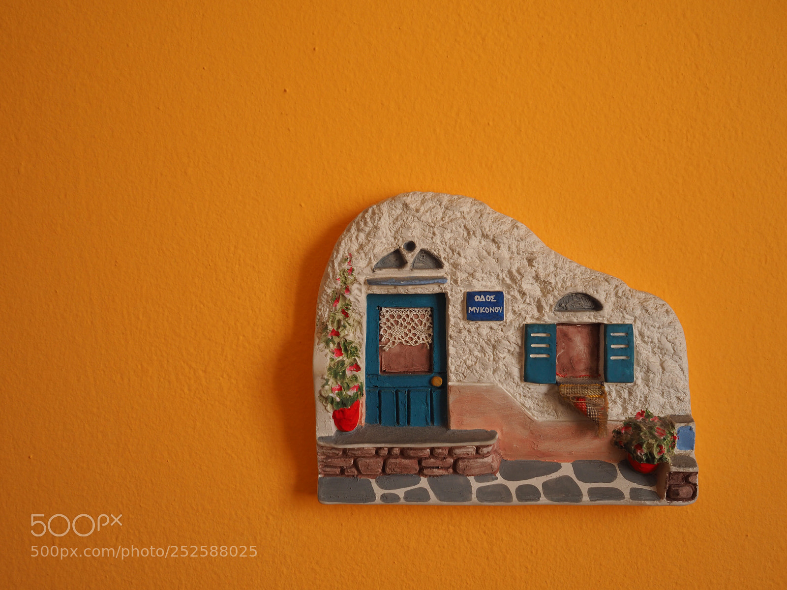 Olympus OM-D E-M10 II sample photo. Orange wall photography