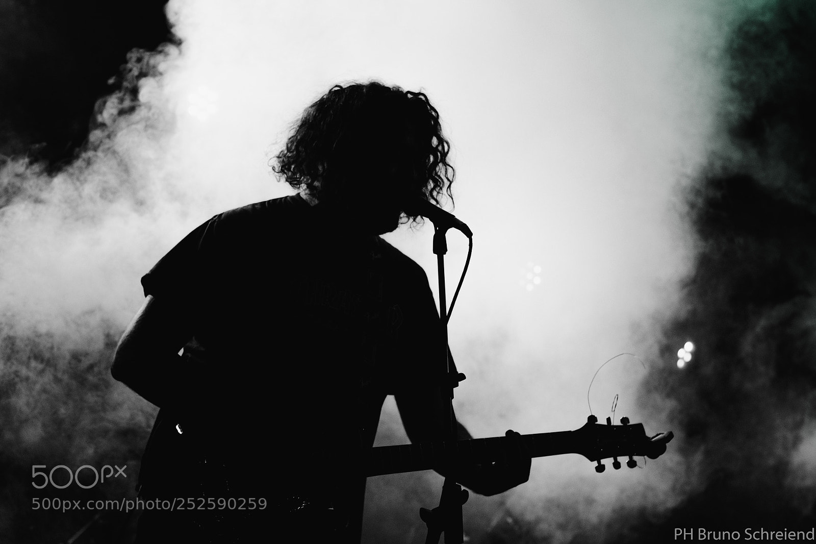 Nikon D3100 sample photo. Guitar player with smoke photography