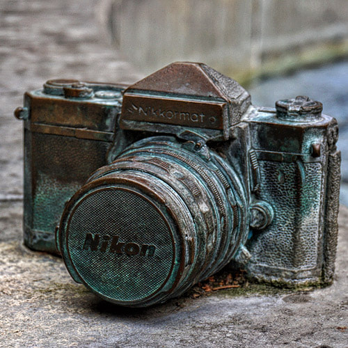 Sony a6000 sample photo. Nikkormat in bronze photography